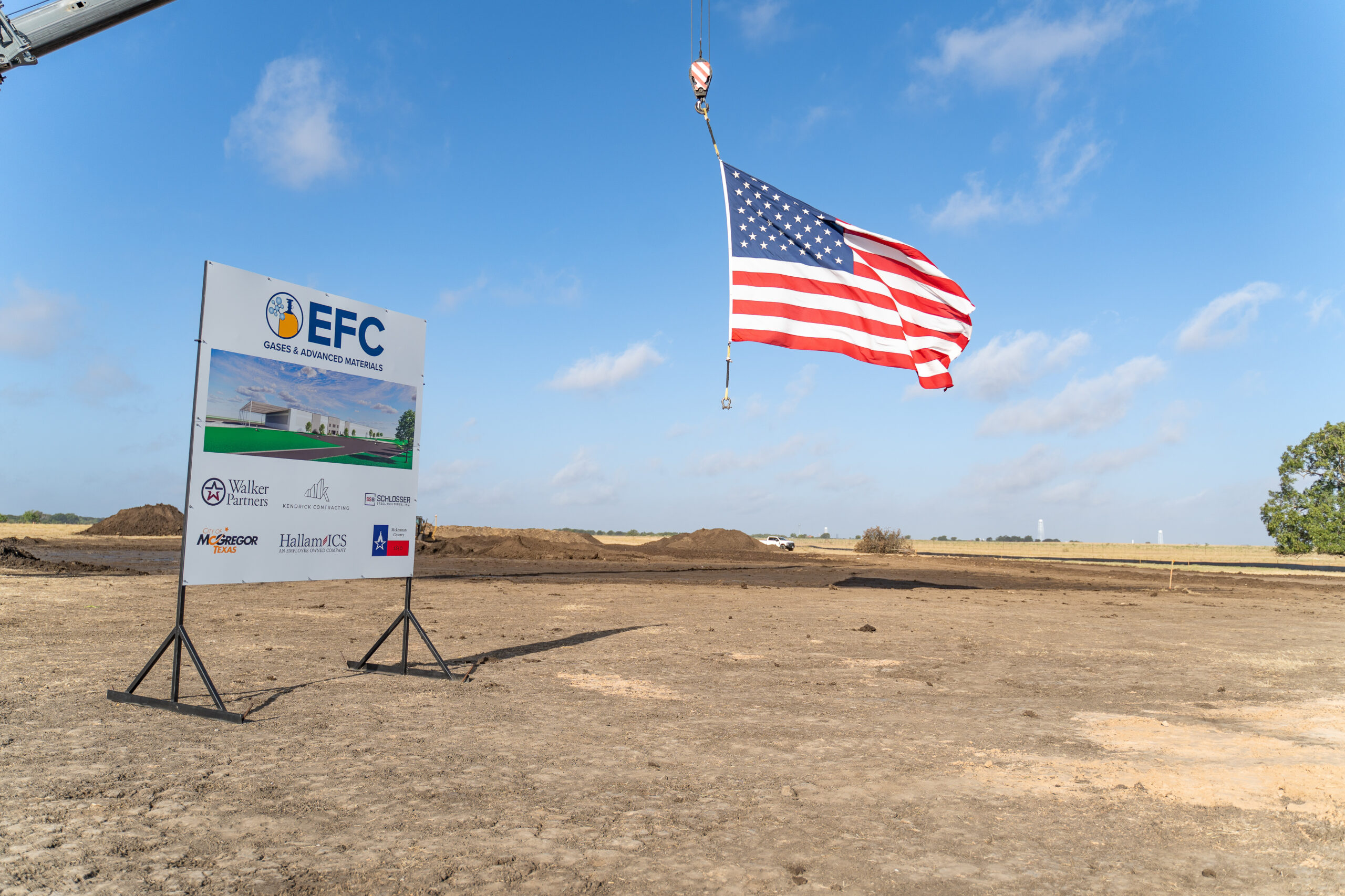 EFC project sign and American flag at the McGregor groundbreaking site.