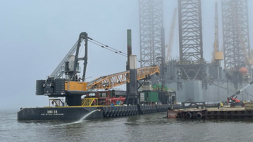 Matthews Brothers dredging equipment on the water