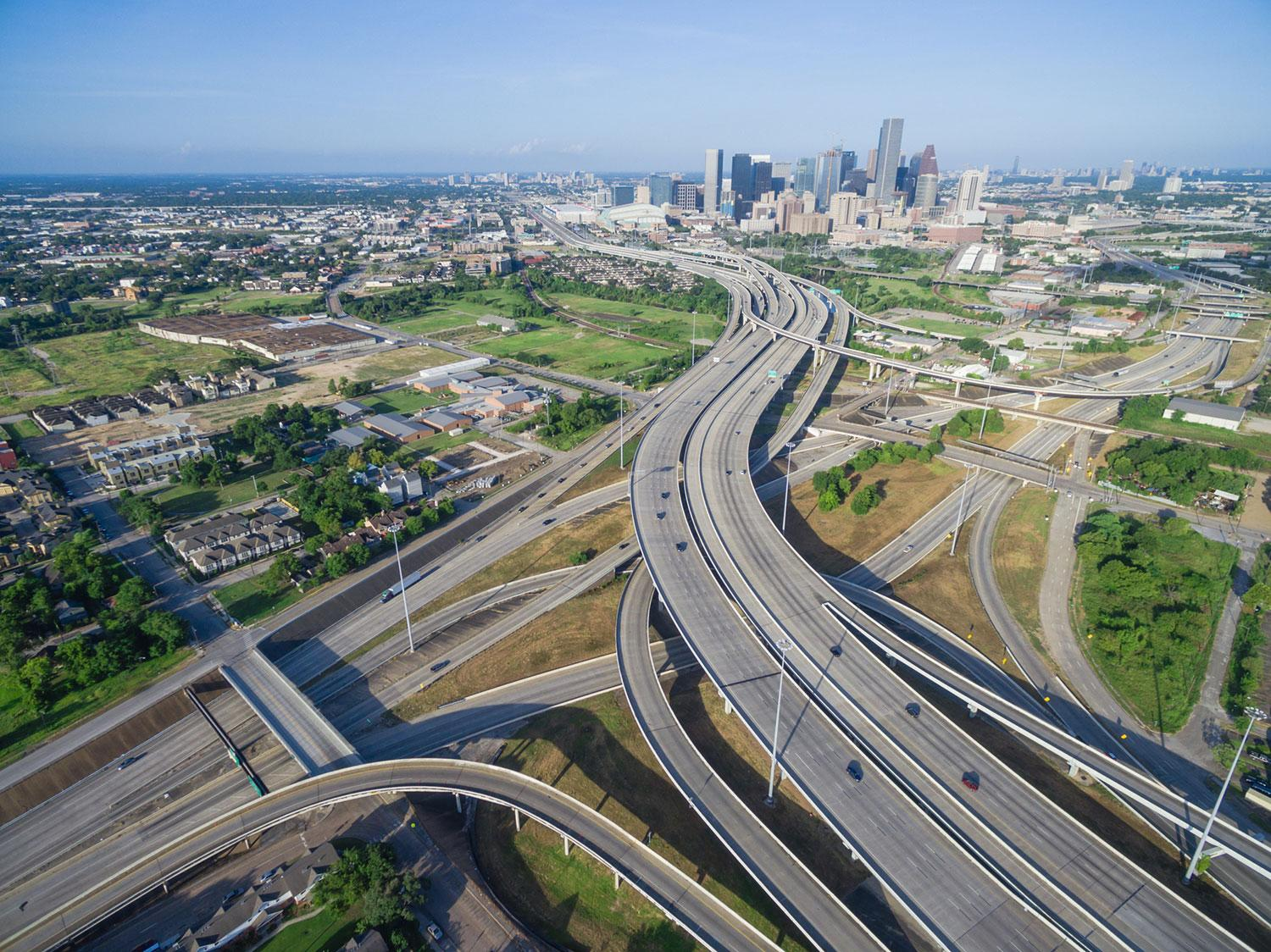 Aerial view of freeway interchanges approaching downtown Houston