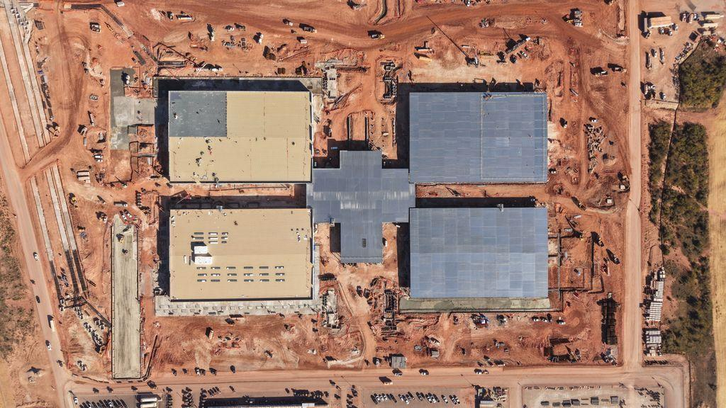 Overhead view of a four-hall building under construction